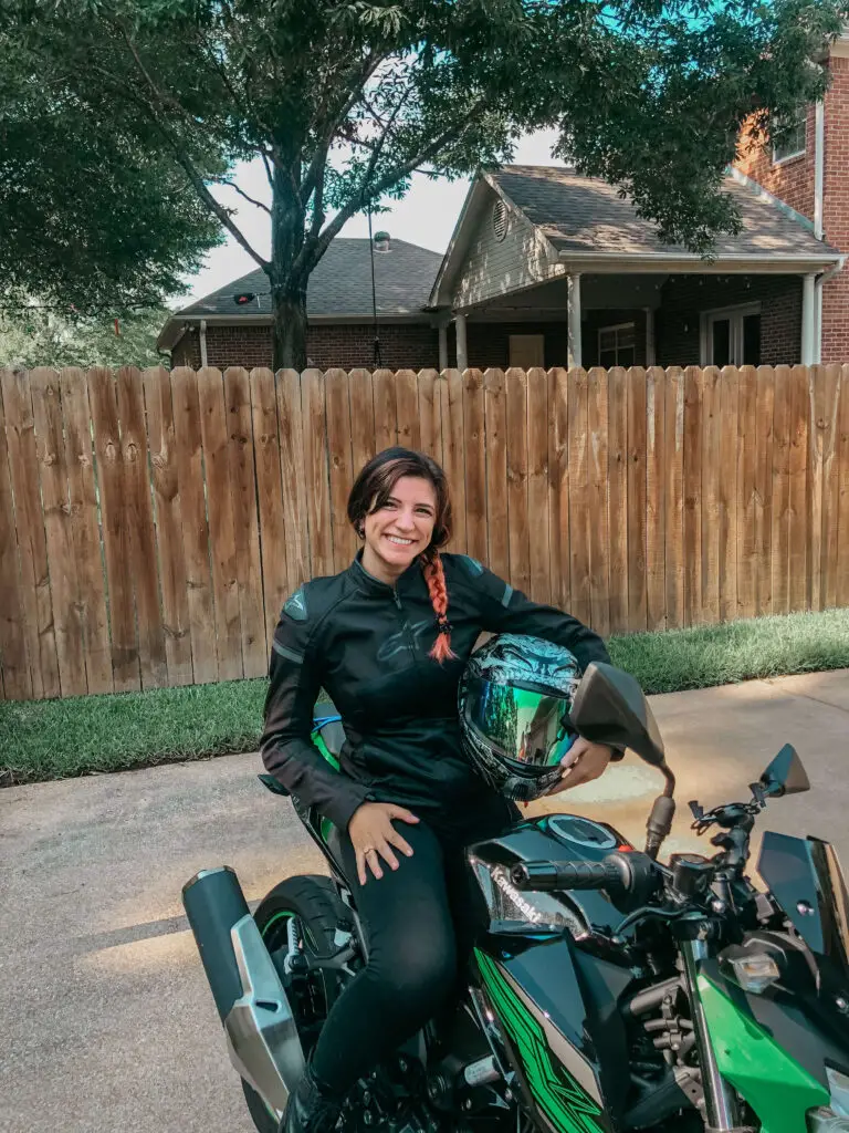 girl sitting on motorcyle