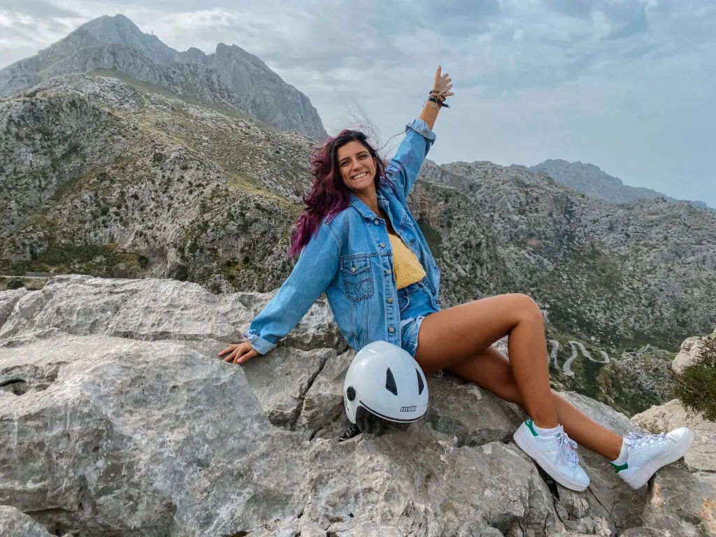 girl on top of rock in palma de mallorca