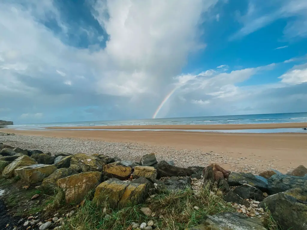 rainbow at omaha beach normandy