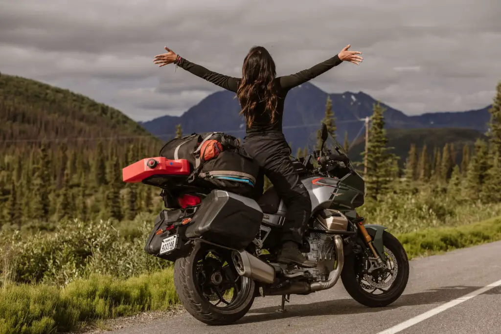girl on motorcycle in alaska
